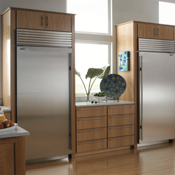 Professional Sub-Zero refrigerator repair technician servicing luxury appliance in Cherry Hills Colorado